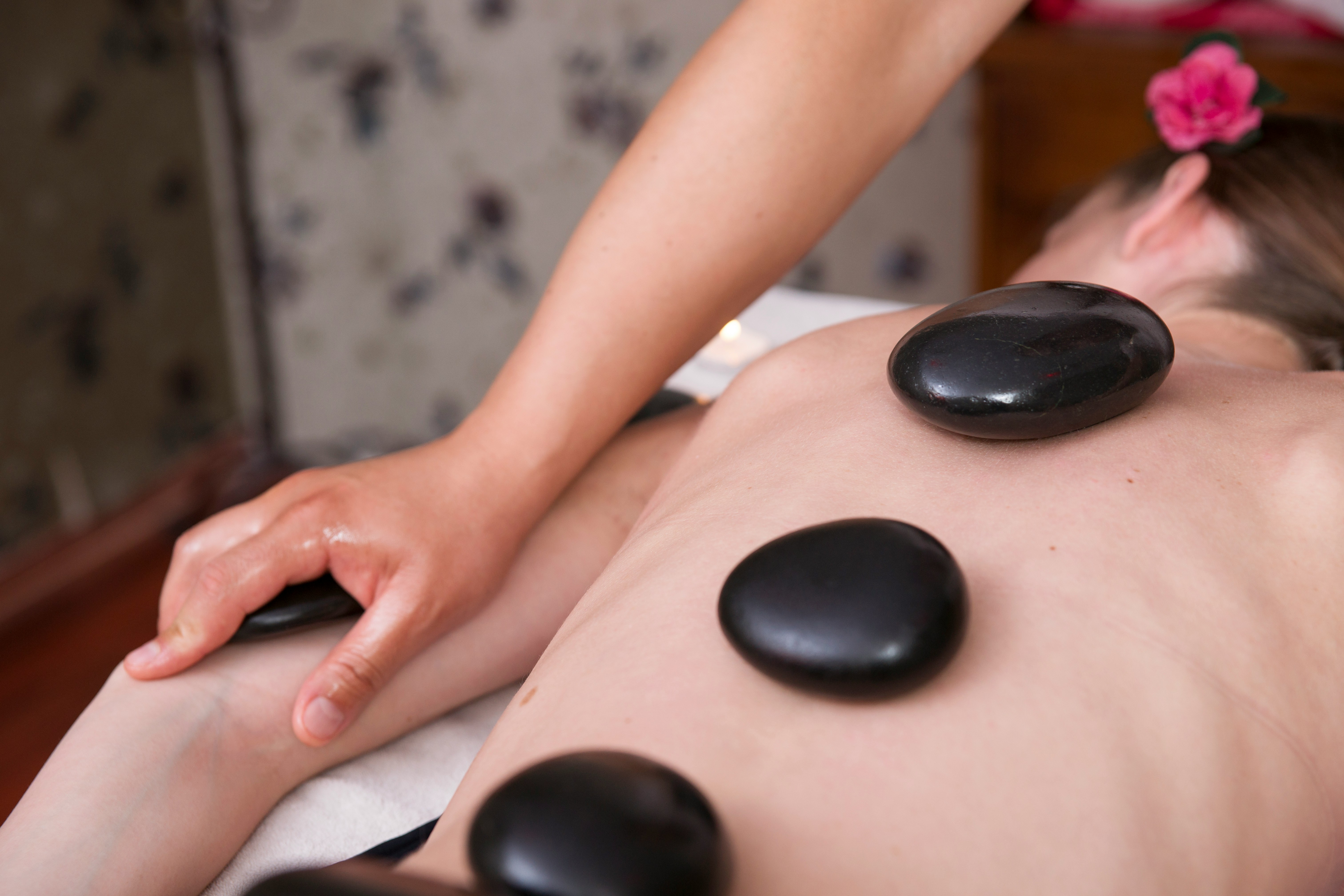 Hot stones on back